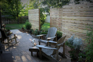 A cedar wood wall built for privacy at a boise area home.